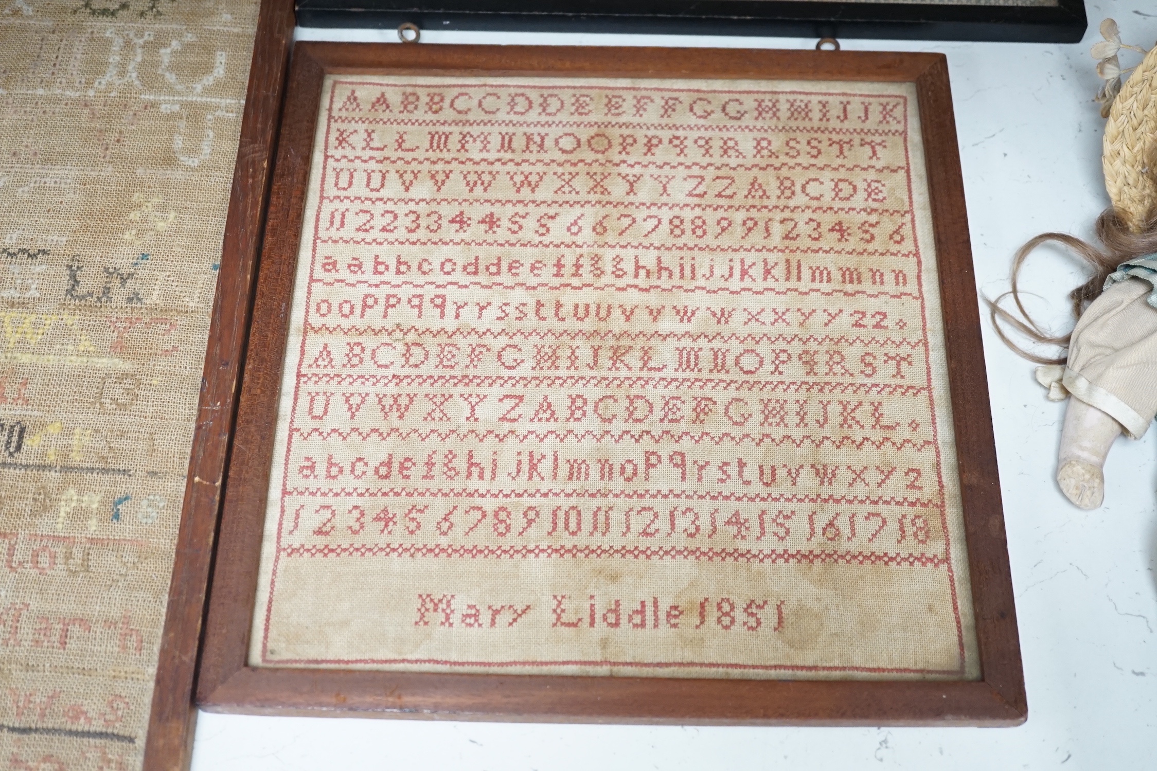 An unusual William IV ‘Register of birth’ small sampler together with four other samplers ranging in date from 1778 to 1851, largest 56 cm x 20.5 cm (5)